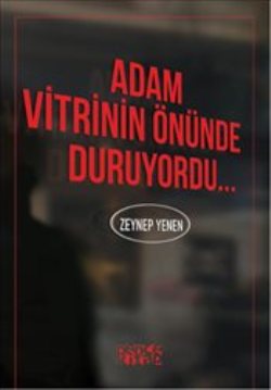 Adam Vitrinin Önünde Duruyordu